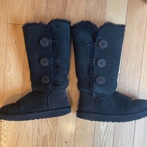 Ugg boots. Tall with 3 buttons. Color black. Size 8.